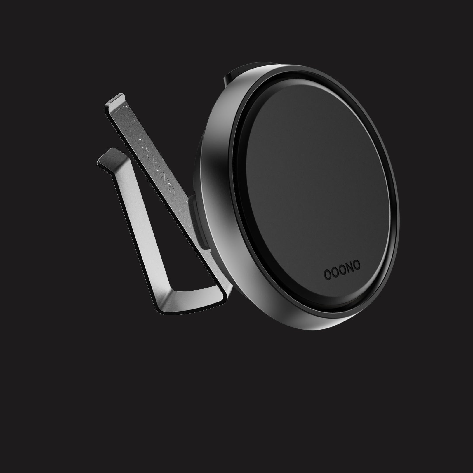 Ooono round black car vent mount with metallic frame and integrated Danish trafikalarm for speed camera alerts.