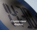 Close-up of a digital clock display showing the words "Crystal clear trafikalarm display" on the screen.