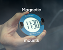 Hand holding a round blue digital timer showing 11:30, with "Magnetic mounts" and "trafikalarm" text on display.