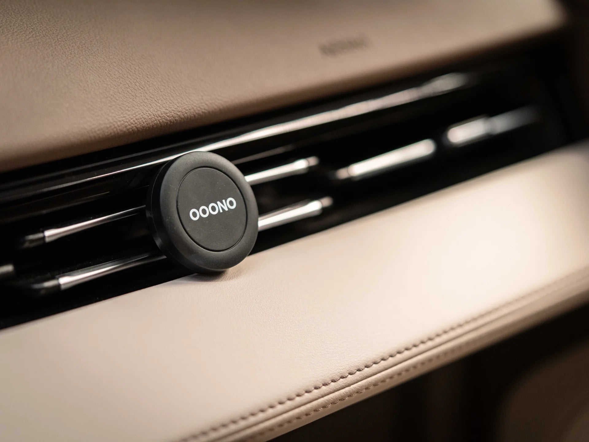 MOUNT NO3 on a car air vent