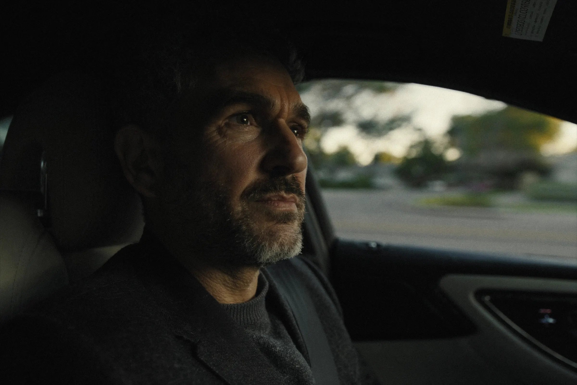A driver looking ahead at the road